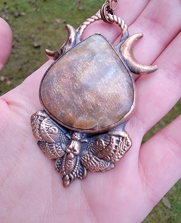 Image of Sunstone Death Moth Pendant