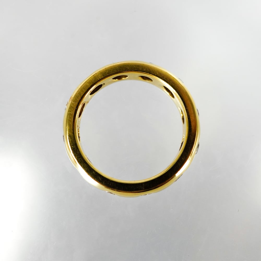 Image of 18ct yellow gold gypsy diamond set wedding band. PJ0779