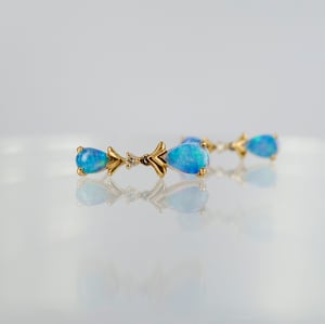 Image of 18ct yellow gold opal & diamond earrings. SH BARRONA