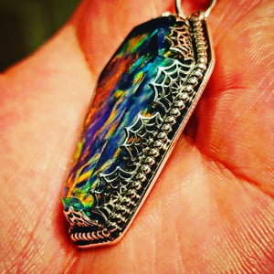 Deadly Aurora opal coffin