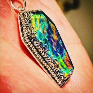 Deadly Aurora opal coffin