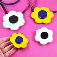 Image 1 of Spinning Flower Necklaces and Brooches