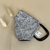 Image 1 of Black and white floral 3 layer cotton fabric reversible face mask