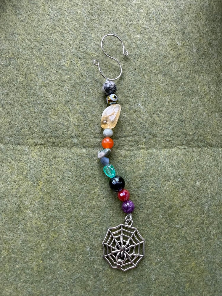 Image of Spiderweb plant charm 🕸️🧡