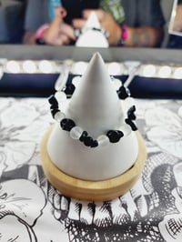 Image 1 of Opal Moonstone Black Skulls
