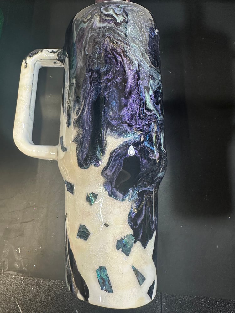 Image of 40oz with rocks purple gold blue