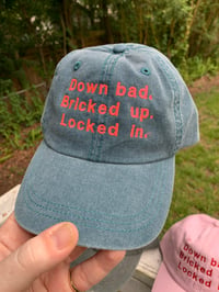 Image 4 of 'Down Bad. Bricked Up. Locked In' Hats
