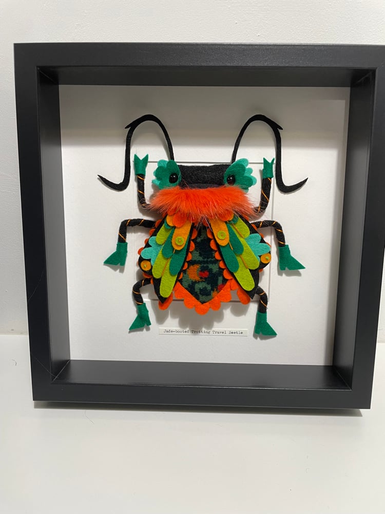 Image of Jade-booted Trotting Travel Beetle