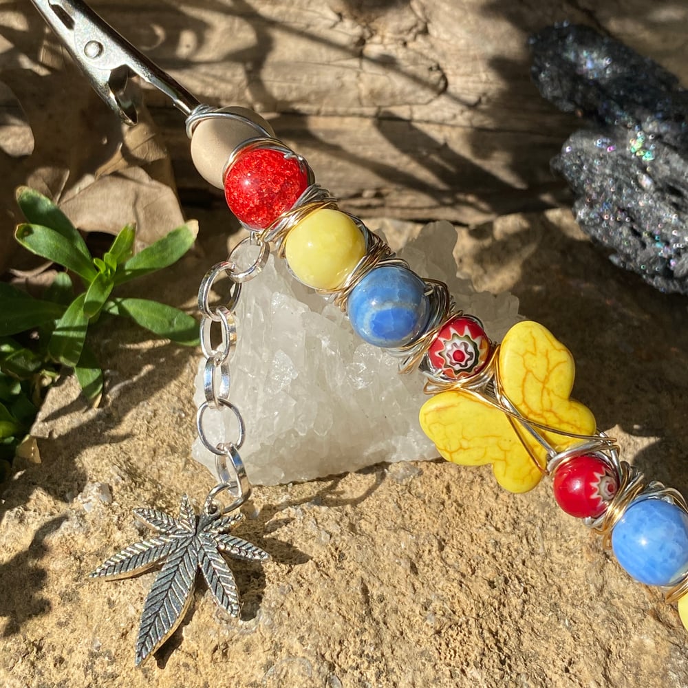 Image of summer butterfly roach clip