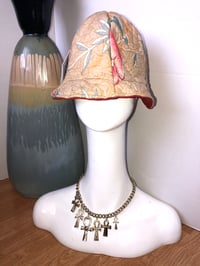 Image 1 of H.O.D. Bucket Hat With Quilted Floral Cotton Printed Fabric And Red Textured Velvet On The Reverse