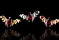 Image 3 of Bat with garnet 