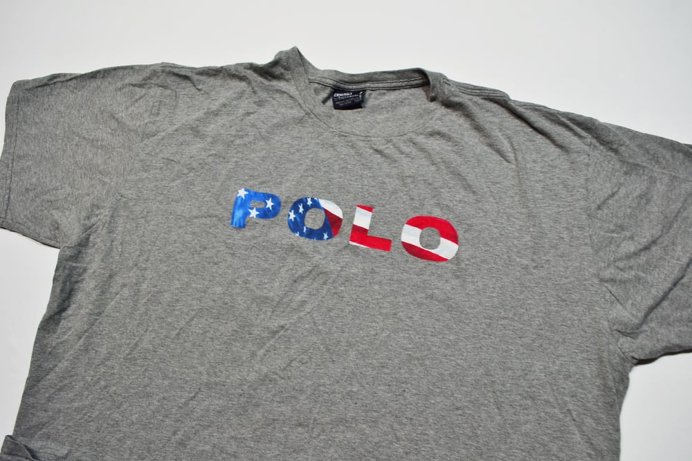 Image of Vintage 1990's Polo by Ralph Lauren USA Flag Spell Out T-Shirt Sz.XXL