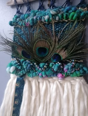 peacock woven wallhanging. 