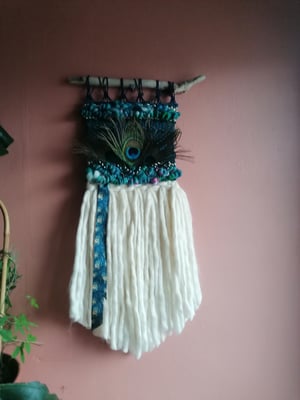 peacock woven wallhanging. 