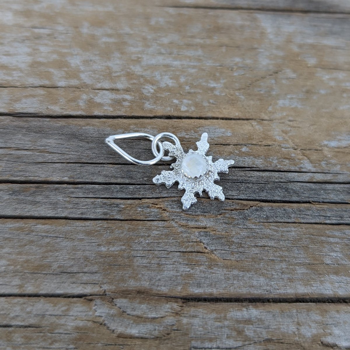 Image of Sterling silver snowflake charm with moonstone 