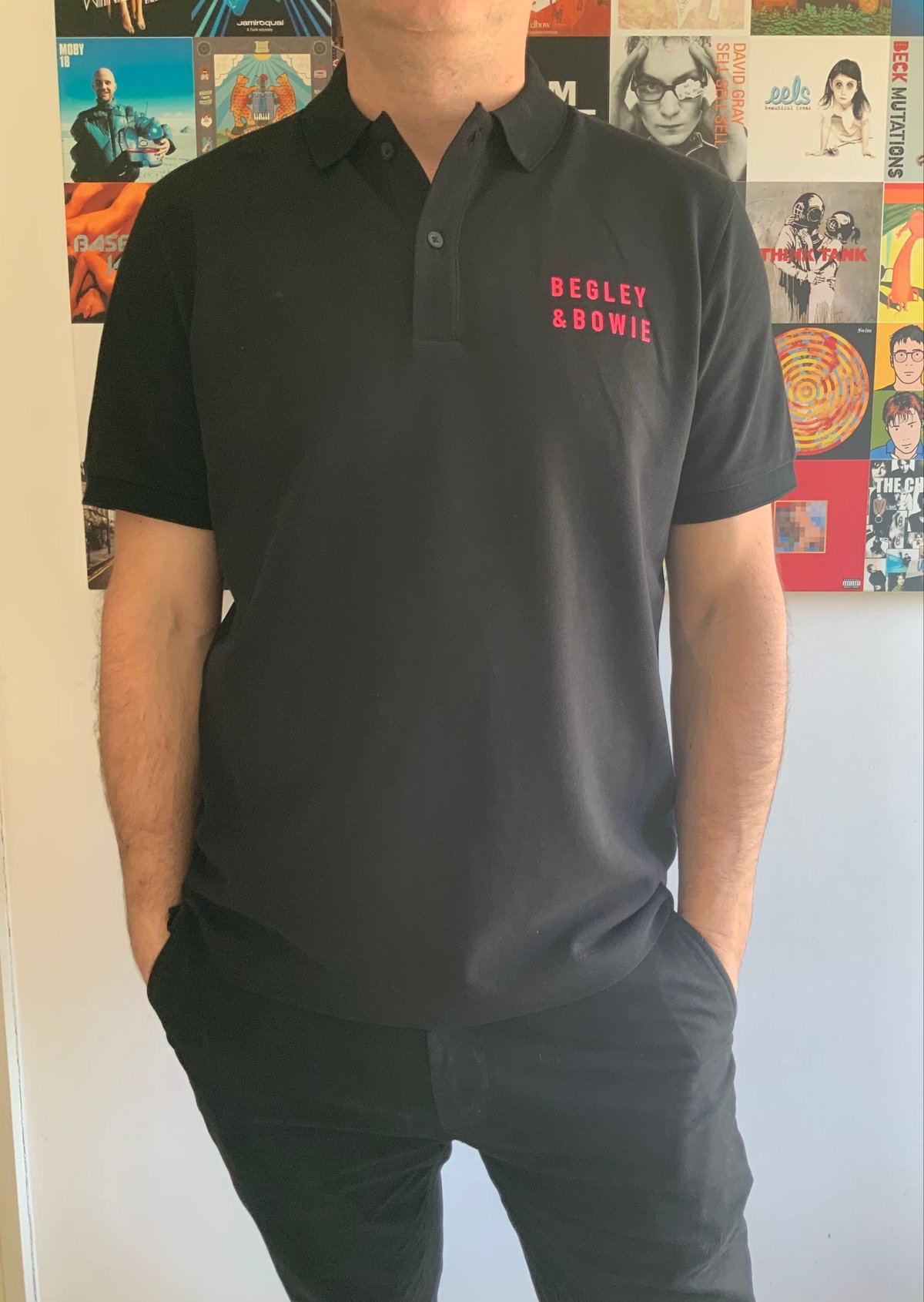 Image of Black Unisex Polo Shirt with Logo 