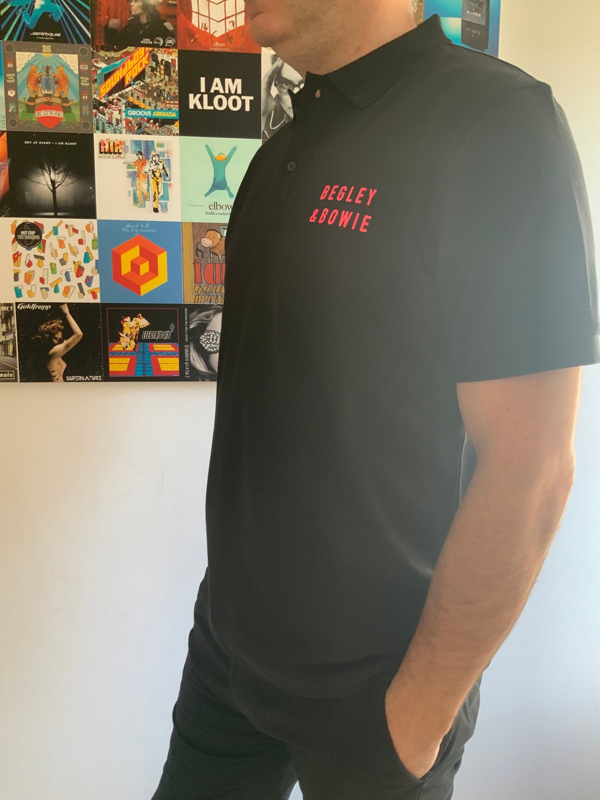 Image of Black Unisex Polo Shirt with Logo