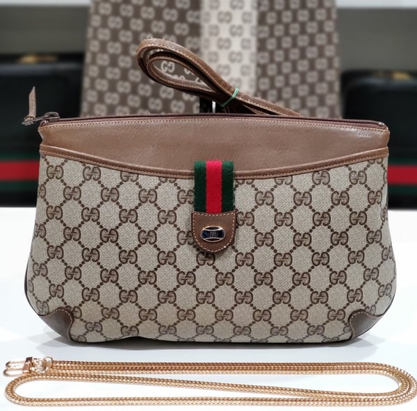 Image of Vtg. Gucci Brown Clutch/Crossbody bag