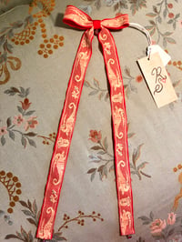 Image 2 of Red long tail bow with vintage dragon lace. 