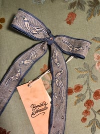 Image 1 of Blue long tail bow with vintage bird lace. 