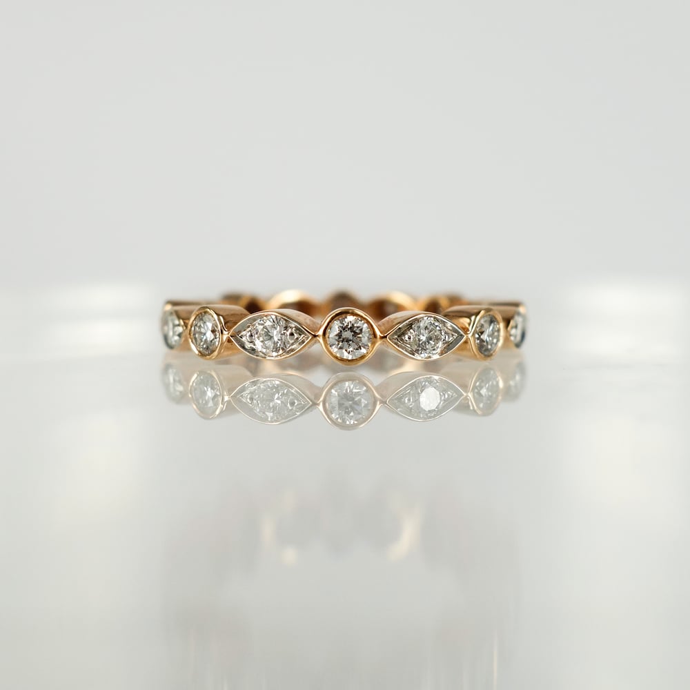 Image of 18ct rose gold celebration style eternity ring. PJ5499