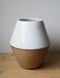 Image of angled white vase