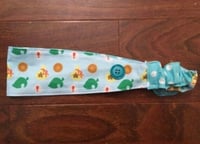 Image 2 of Saw Puppy Reversible Headband