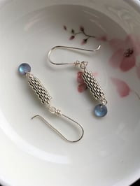 Silver beaded blue dangle earrings 