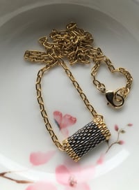 Black and gold woven shimmer bead charm necklace  