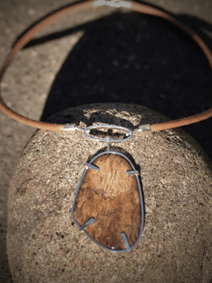 Image of  Skipping stone kinetic pendant and necklace 