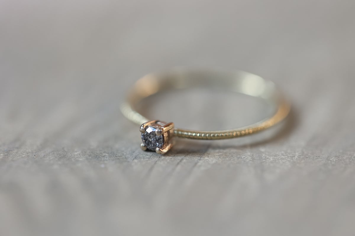 Image of 18ct gold salt and pepper diamond ring