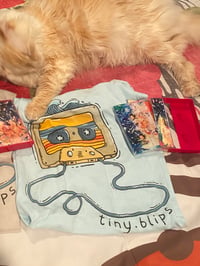 ice blue t shirt + cassette album