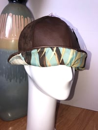 Image 5 of H.O.D. Bucket Hat Chocolate Butter Leather Crown W/Reversible Leaf Print Cotton Fabric Side
