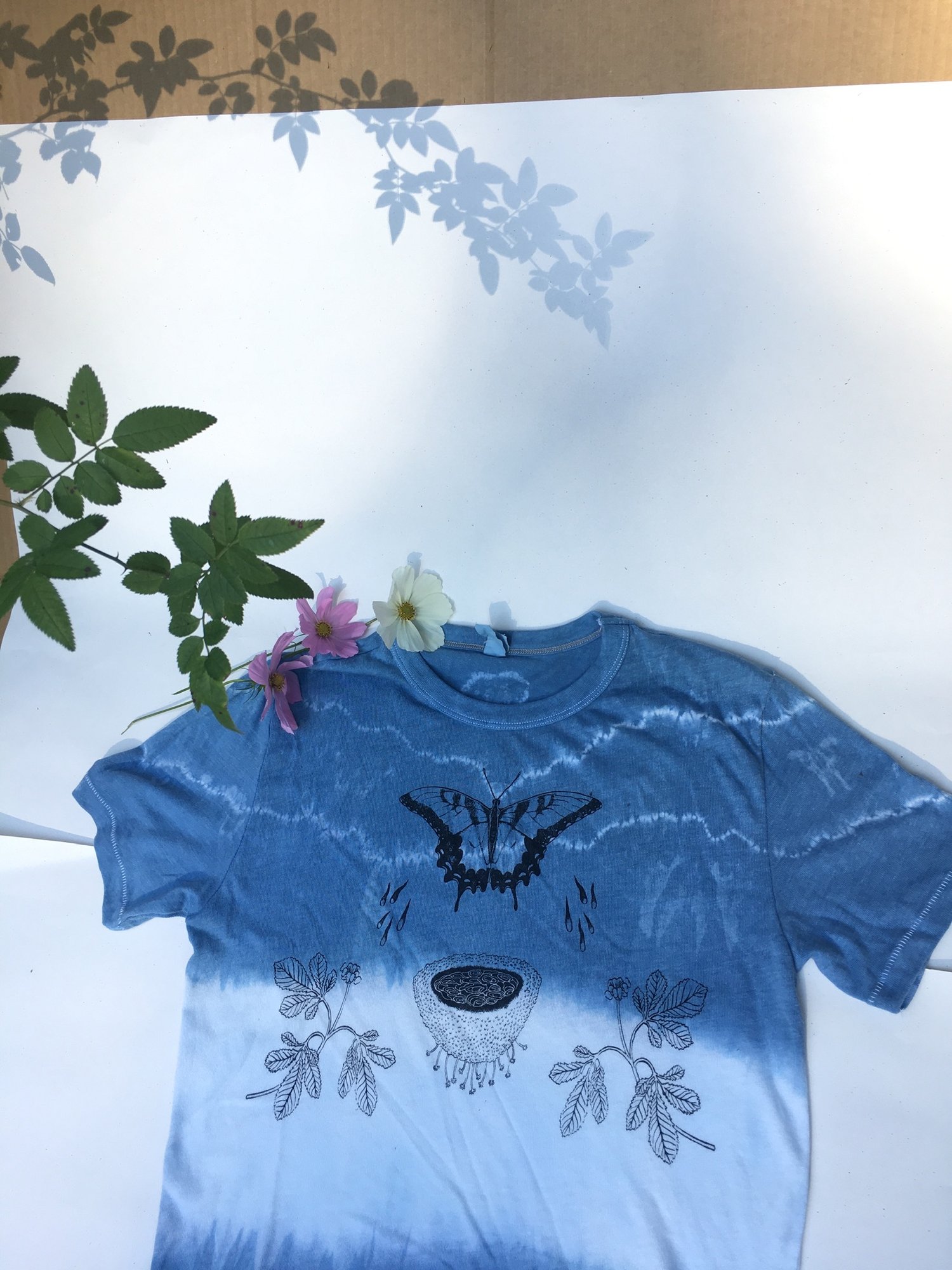 Image of butterfly water tee with shibori dye 