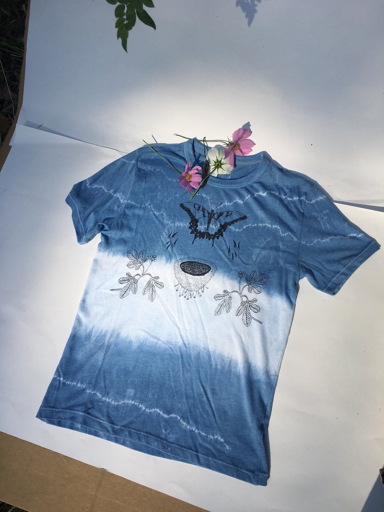 Image of butterfly water tee with shibori dye 