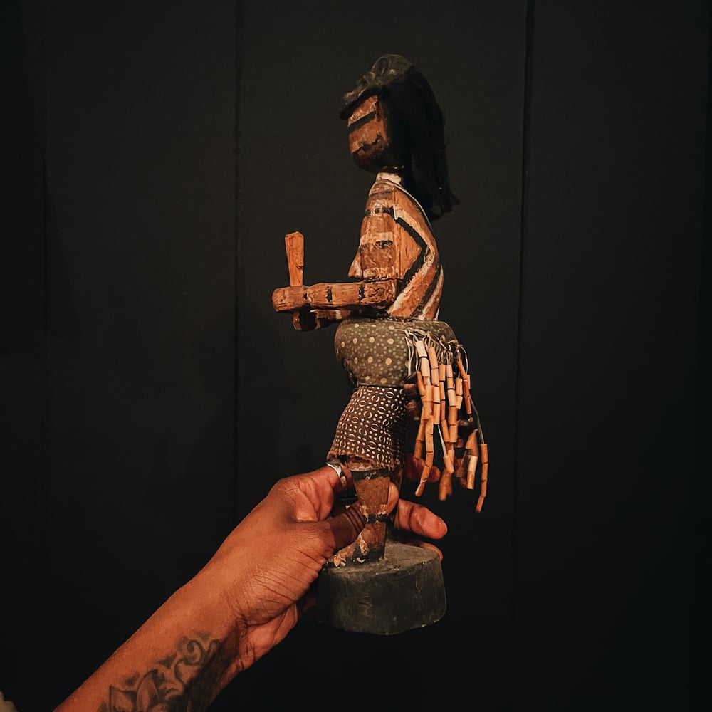 Carved Figure of a Woman with Mask