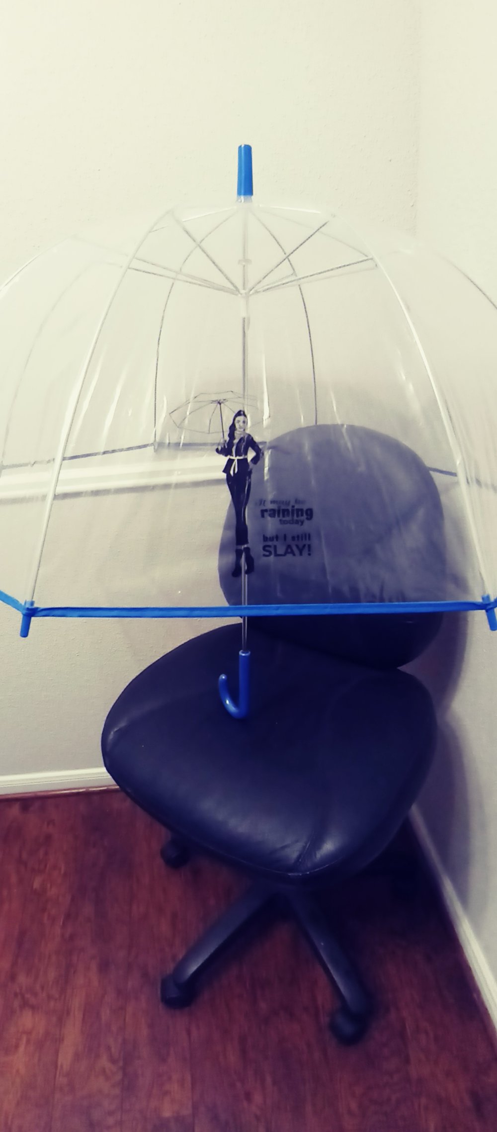 Image of Clear Bubble Umbrella with Blue handle Blue top piece 