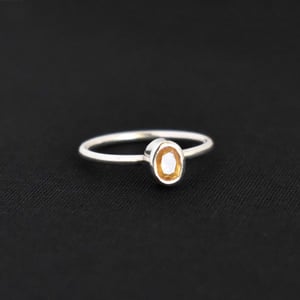 Image of Sri Lanka Honey Yellow Sapphire oval cut classic silver ring