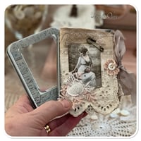 Image 3 of vintage snippet book with a window