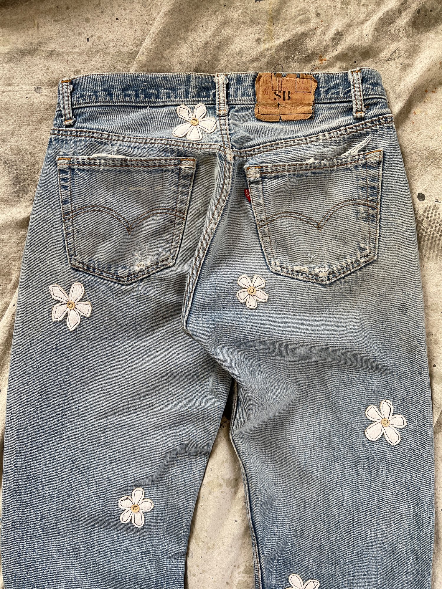Image of Floral repaired jean 