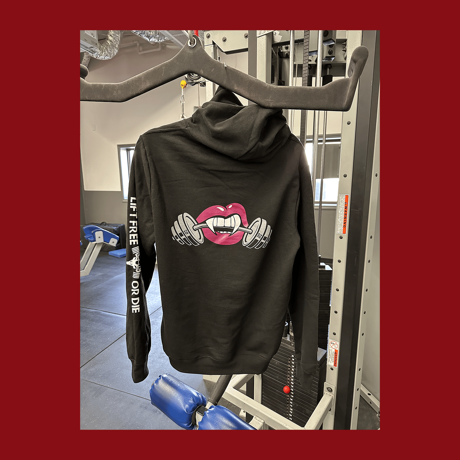 merch-hoodie-lips-hanging-back.png?auto=format\u0026fit=max