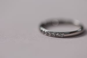 Image of Platinum 2mm plain court semi Eternity ring