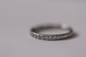 Image of Platinum 2mm horn textured semi eternity ring
