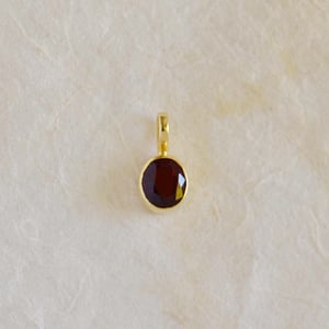 Image of Red Garnet oval cut 14k gold necklace