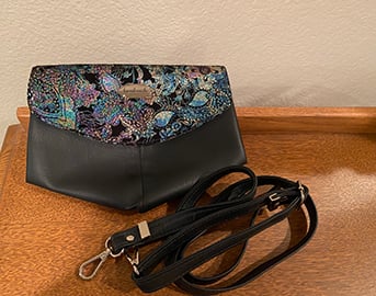 Image of Skye Crossbody Bag in Black and Blue Patterned Leather