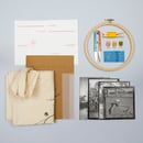 Image of Kit de bordado sobre papel y bolsa de tela.