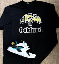 Image 1 of OAKLAND TOWN TREE white and yellow T-SHIRT $20/ HOODIE $40