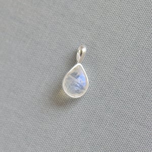 Image of Rainbow Moonstone pear spherical shape faceted cut silver lined necklace