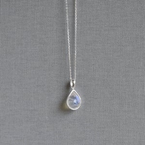 Image of Rainbow Moonstone pear spherical shape faceted cut silver lined necklace