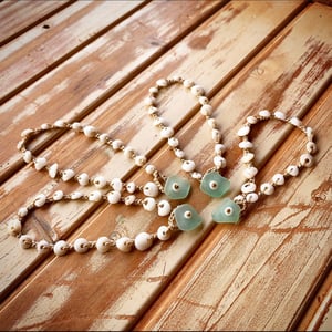 Image of Dainty puka shell anklet with seafoam seaglass closure.